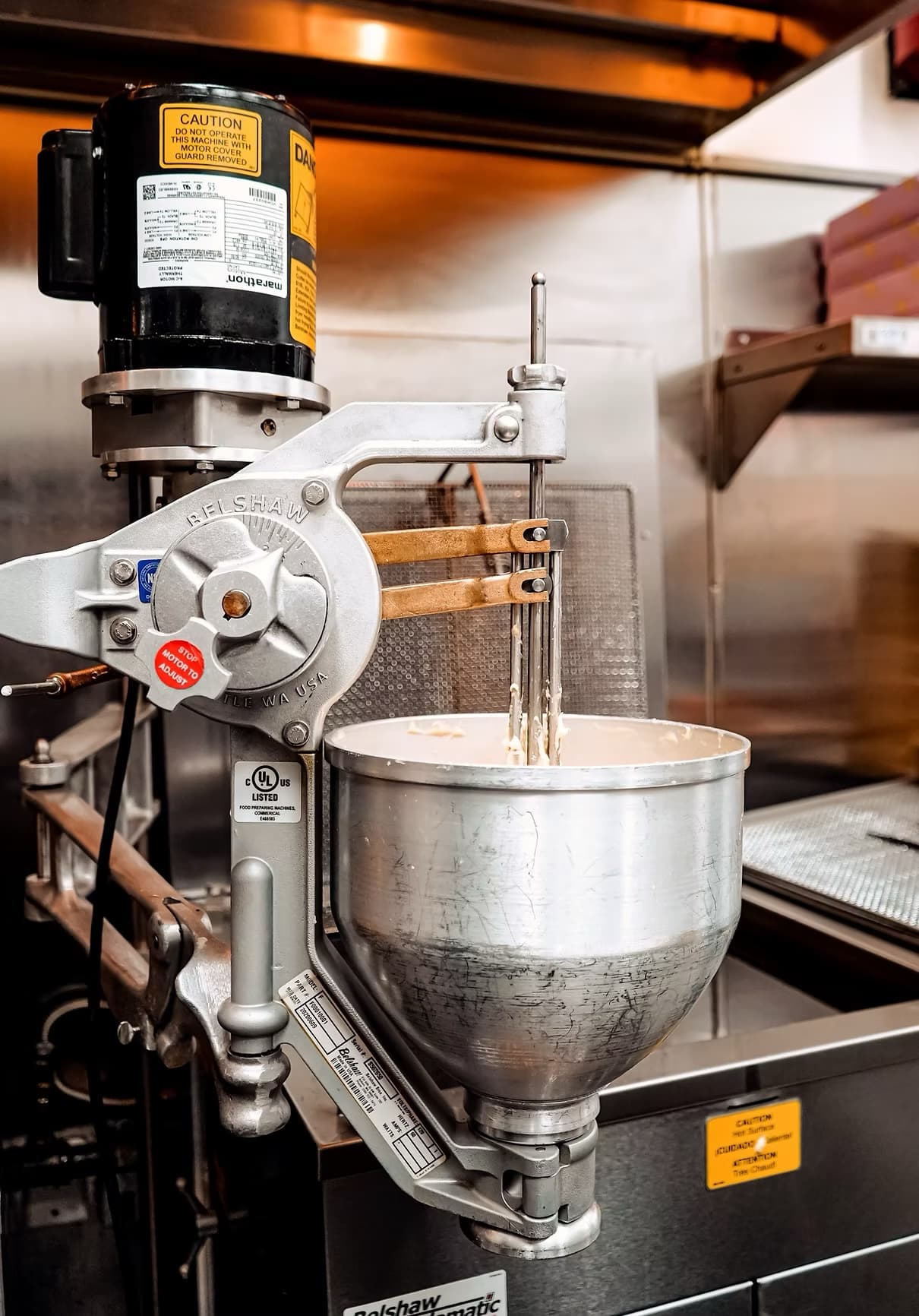 Industrial mixer preparing mochi donut dough